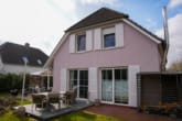 Gartenansicht des Hauses - Individuelles & liebevoll eingerichtetes Einfamilienhaus mit offenem Grundriss in direkter Fleetlage