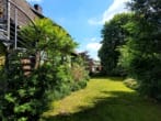 Gartenansicht - Ruhig gelegenes Einfamilienhaus mit Einliegerwohnung, Keller & Garage am Ende einer Sackgasse