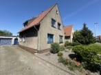 Seitenansicht - Gepflegtes, charmantes Zweifamilienhaus mit Teilkeller, Garage, Garten im Grünen in bevorzugter Lage